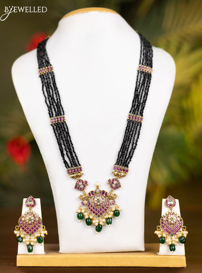 Beaded multilayer black necklace with kemp & cz stones and pearl & green beads hangings