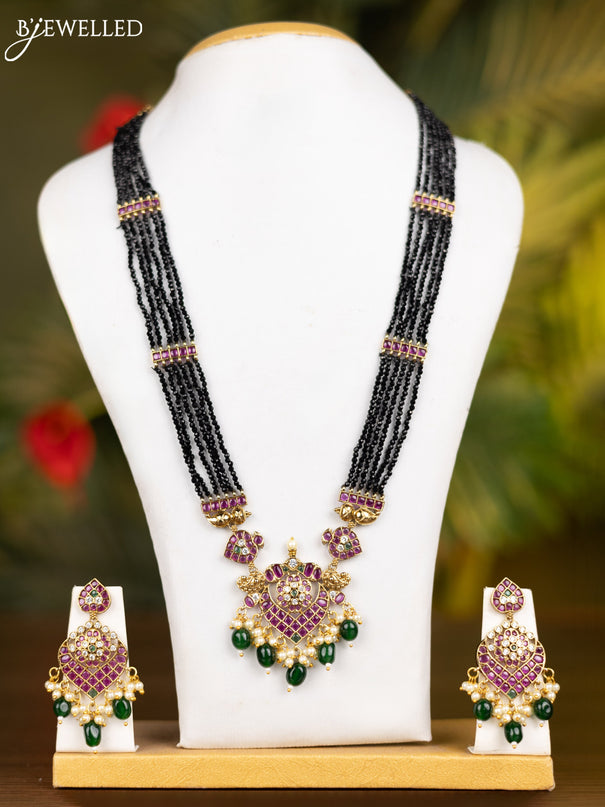 Beaded multilayer black necklace with kemp & cz stones and pearl & green beads hangings