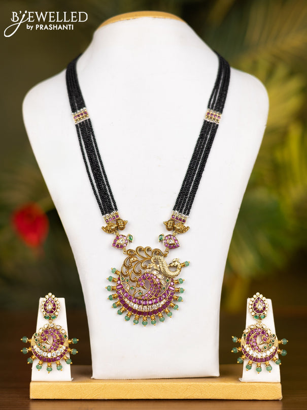Beaded multilayer black necklace peacock & chandbali design with kemp & cz stones and mint green beads