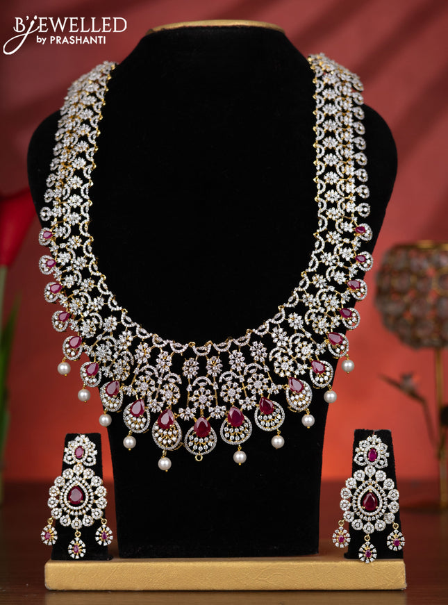 Zircon haaram detachable pendant with ruby & cz stones and pearl hangings in gold finish