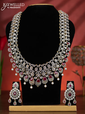 Zircon haaram detachable pendant with ruby & cz stones and pearl hangings in gold finish