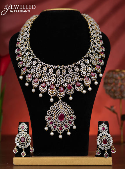 Zircon haaram detachable pendant with ruby & cz stones and pearl hangings in gold finish