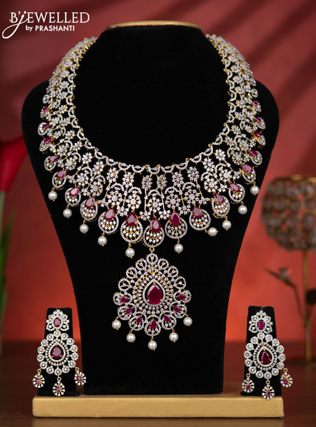 Zircon haaram detachable pendant with ruby & cz stones and pearl hangings in gold finish