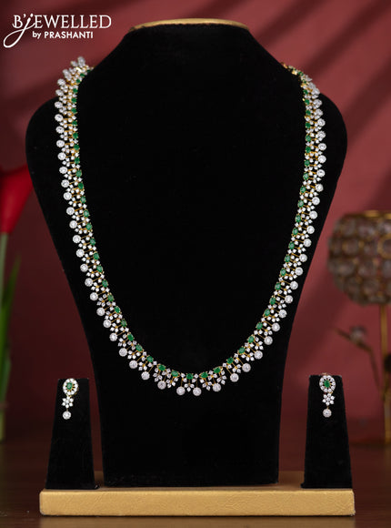Zircon haaram with emerald and cz stones in gold finish