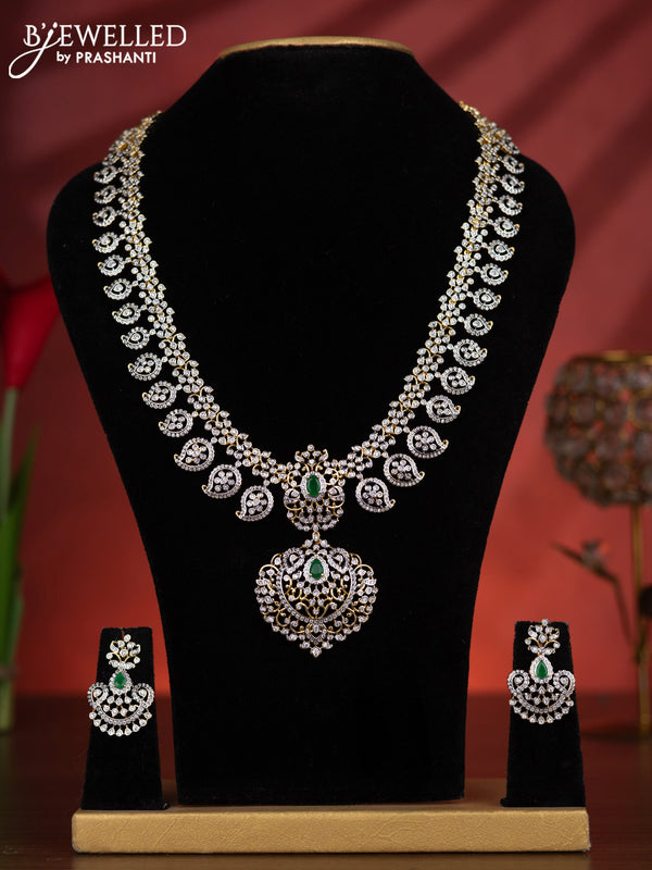 Zircon haaram manga pattern with emerald and cz stones in gold finish