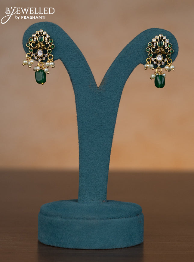 Invisible chain elephant design with emerald & cz stones and pearl & green beads hangings