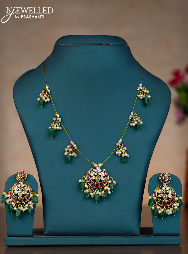 Invisible chain chandbali design with kemp & kundan stones and pearl & green beads hangings