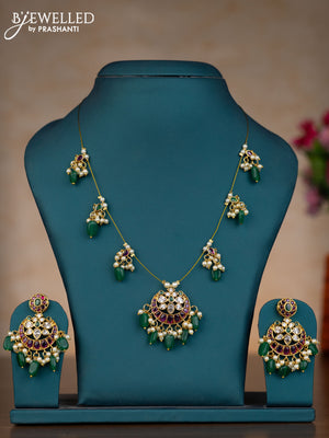 Invisible chain chandbali design with kemp & kundan stones and pearl & green beads hangings