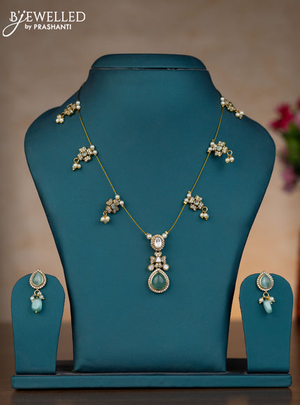 Invisible chain floral design with mint green & kundan cz stones and pearl hangings