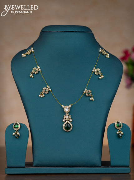 Invisible chain floral design with emerald & kundan cz stones and pearl hangings