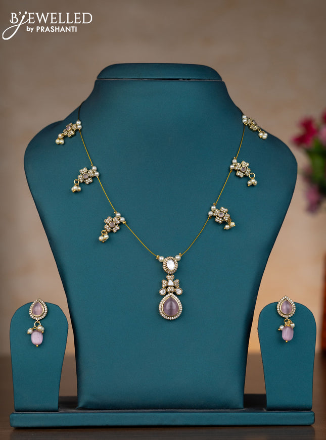 Invisible chain floral design with baby pink & kundan cz stones and pearl hangings