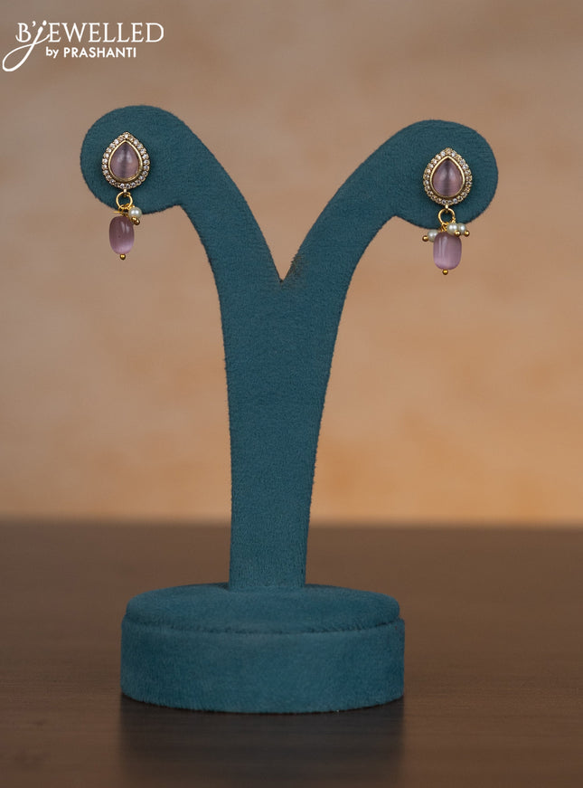 Invisible chain floral design with baby pink & kundan cz stones and pearl hangings