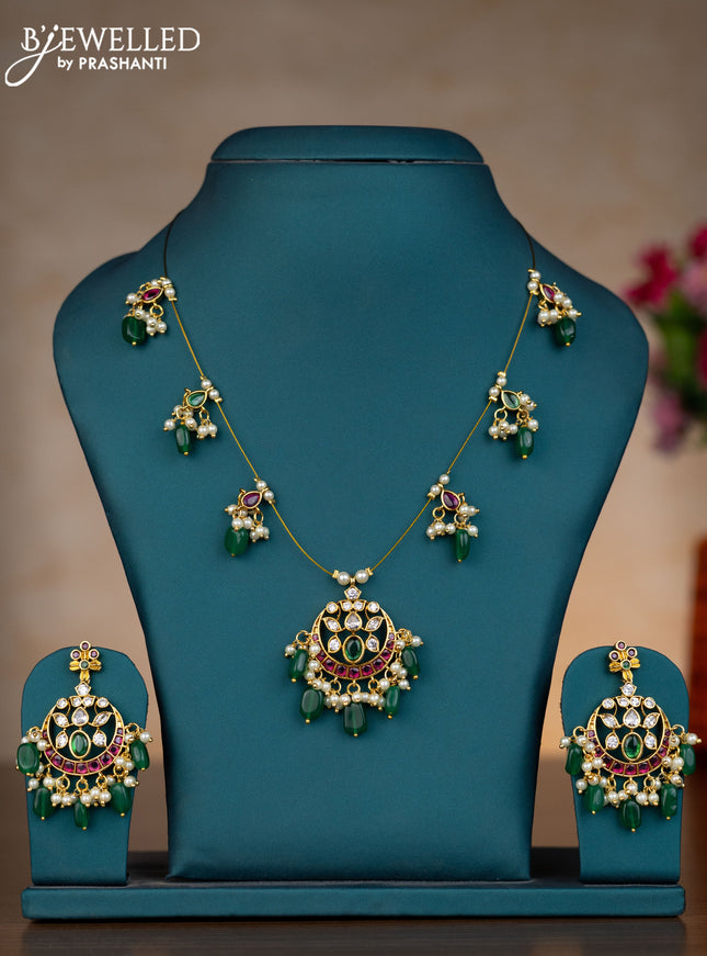 Invisible chain chandbali design with kemp & kundan stones and pearl & green beads hangings