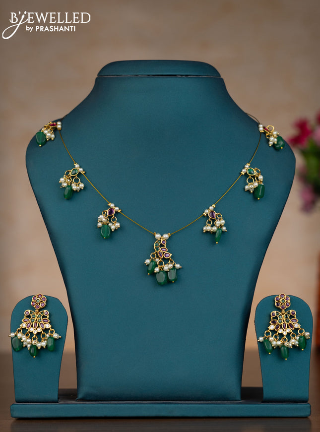 Invisible chain peacock design with kemp stones and pearl & green beads hangings