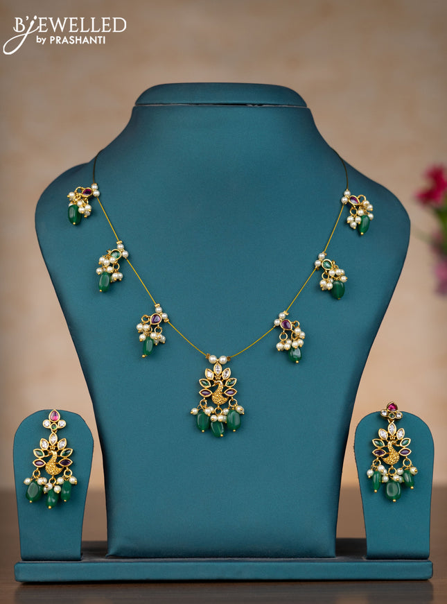 Invisible chain peacock design with kemp & kundan stones and pearl & green beads hangings