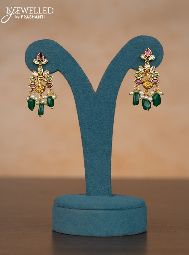 Invisible chain peacock design with kemp & kundan stones and pearl & green beads hangings