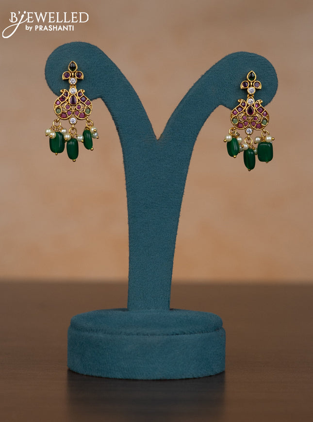 Invisible chain double peacock design with kemp & cz stones and pearl & green beads hangings