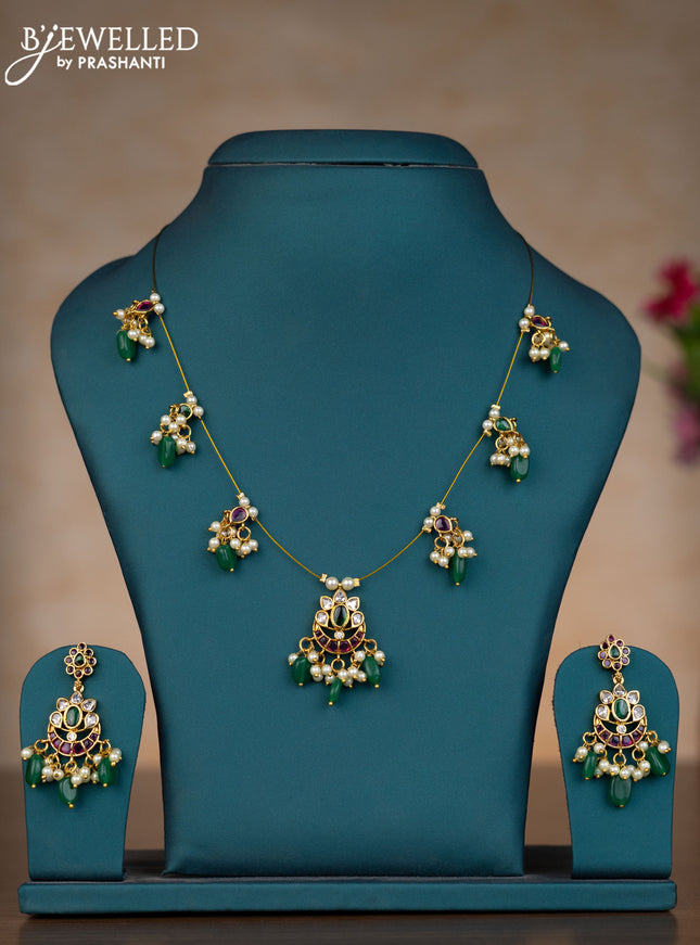 Invisible chain chandbali design with kemp & kundan stones and pearl & green beads hangings