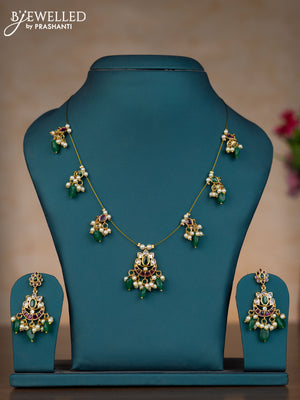 Invisible chain chandbali design with kemp & kundan stones and pearl & green beads hangings