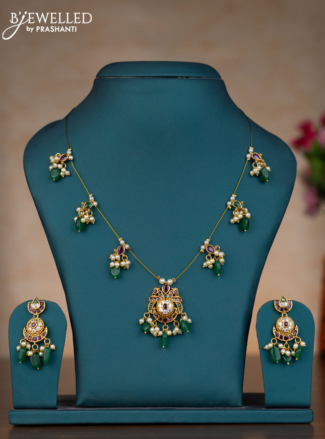 Invisible chain chandbali design with kemp & cz stones and pearl & green beads hangings