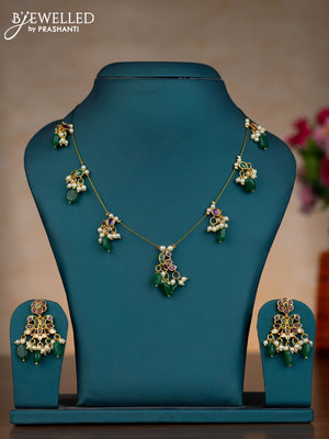 Invisible chain double peacock design with kemp & cz stones and pearl & green beads hangings