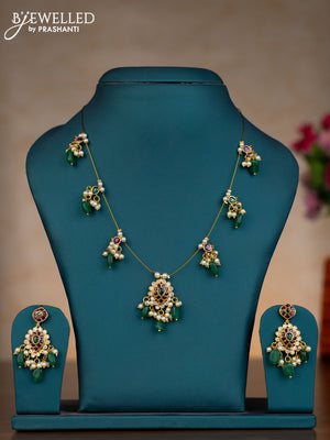 Invisible chain with kemp & cz stones and pearl & green beads hangings