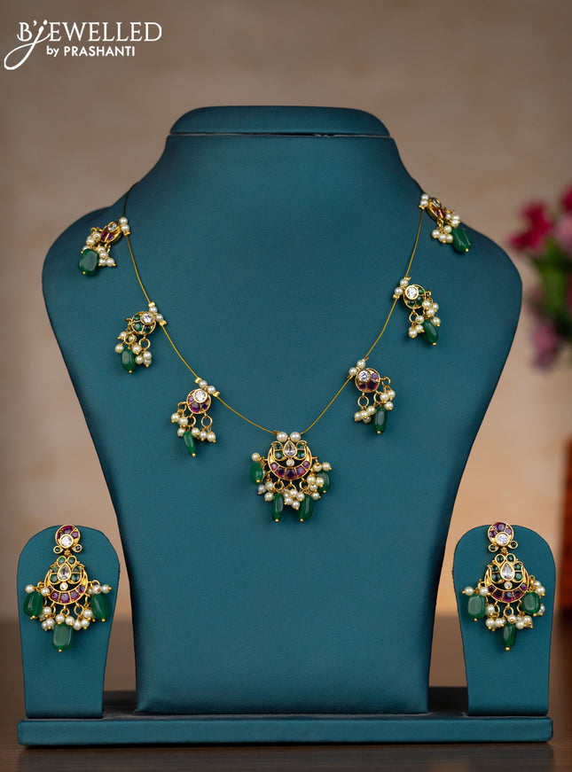 Invisible chain chandbali design with kemp & kundan stones and pearl & green beads hangings