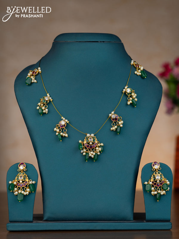 Invisible chain chandbali design with kemp & kundan stones and pearl & green beads hangings