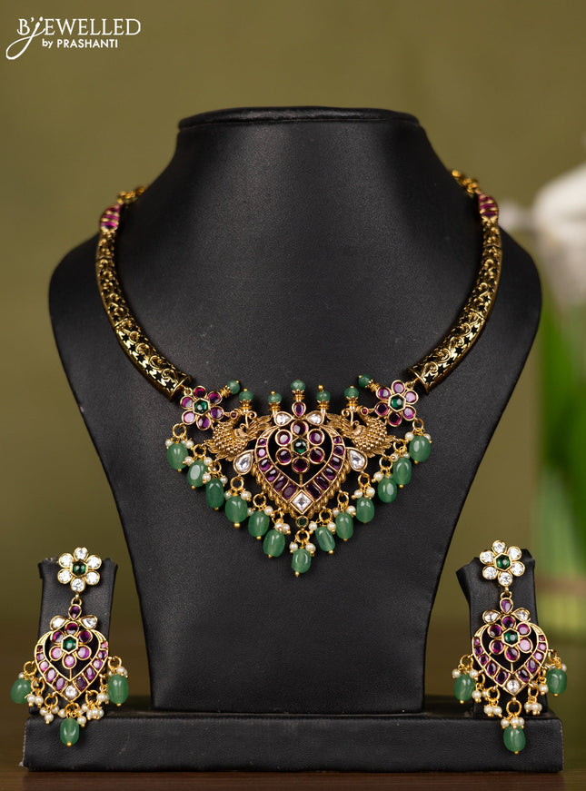 Antique necklace peacock design with kemp & kundan stones and pearl & mint green beads hangings