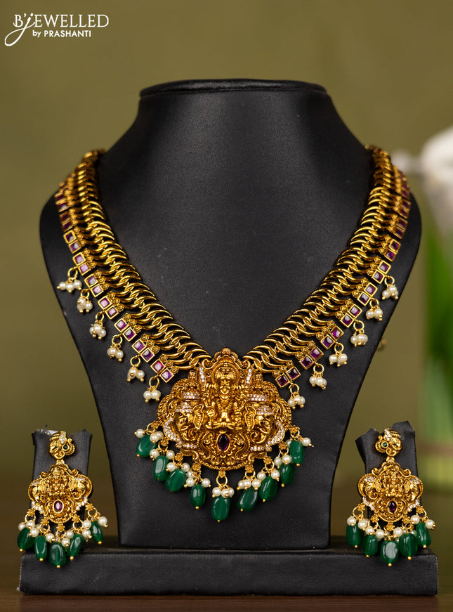Antique necklace lakshmi design with kemp & cz stones and pearl & green beads hangings