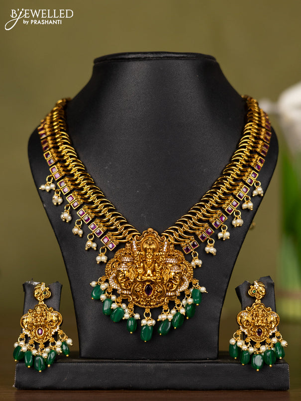 Antique necklace lakshmi design with kemp & cz stones and pearl & green beads hangings