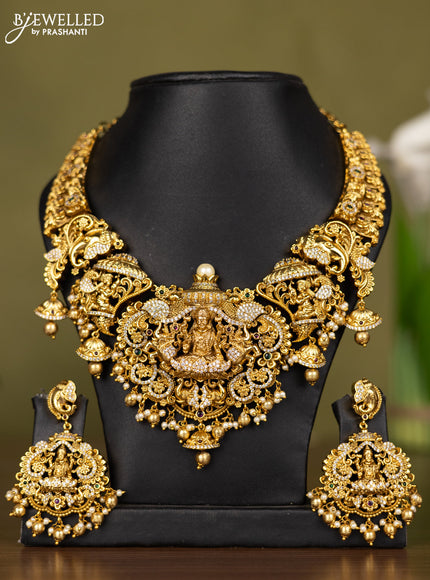 Antique necklace lakshmi design with kemp & cz stones and pearl & golden beads hangings