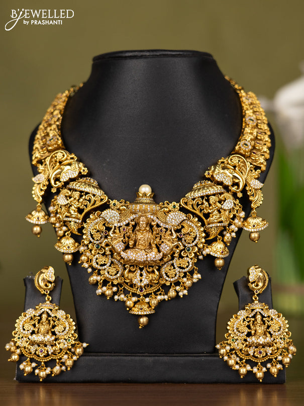 Antique necklace lakshmi design with kemp & cz stones and pearl & golden beads hangings