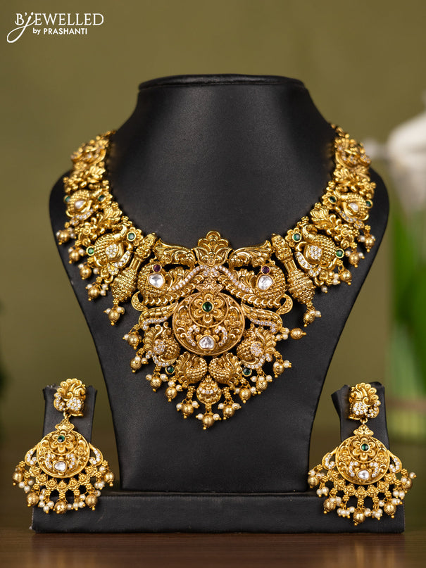 Antique necklace peacock design with kemp & kundan cz stones and pearl & golden beads hangings