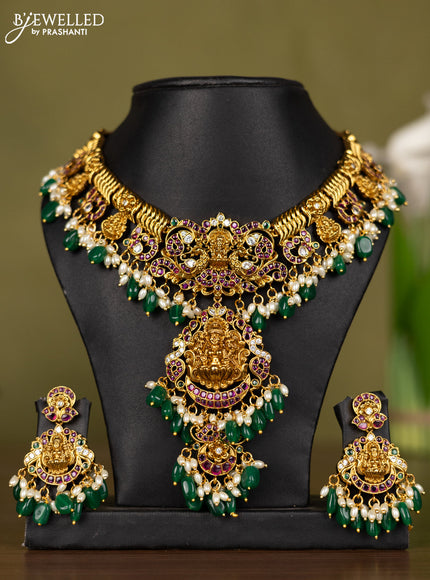 Antique necklace lakshmi design with kemp & kundan stones and pearl & green beads hangings