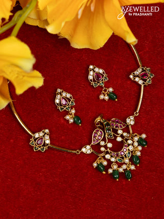 Antique ring type choker peacock design with kemp & cz stones and pearl & green beads hangings