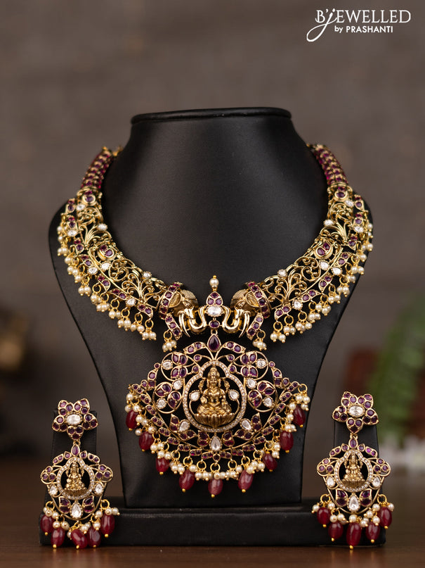 Necklace lakshmi pendant with kundan stones and natural beads & pearl hangings in victorian finish