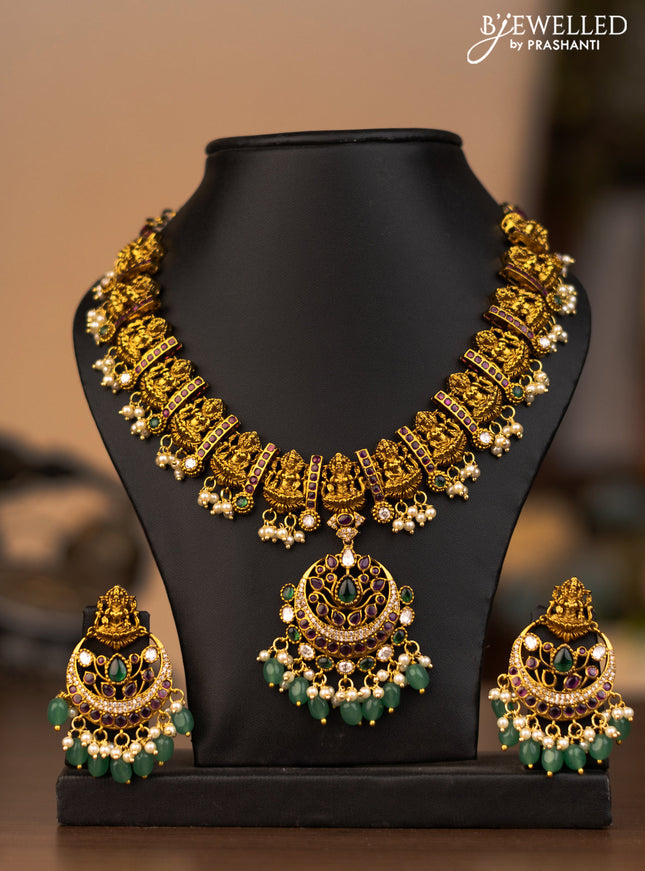 Antique necklace lakshmi pendant with kemp kundan stones and green beads & pearl hangings