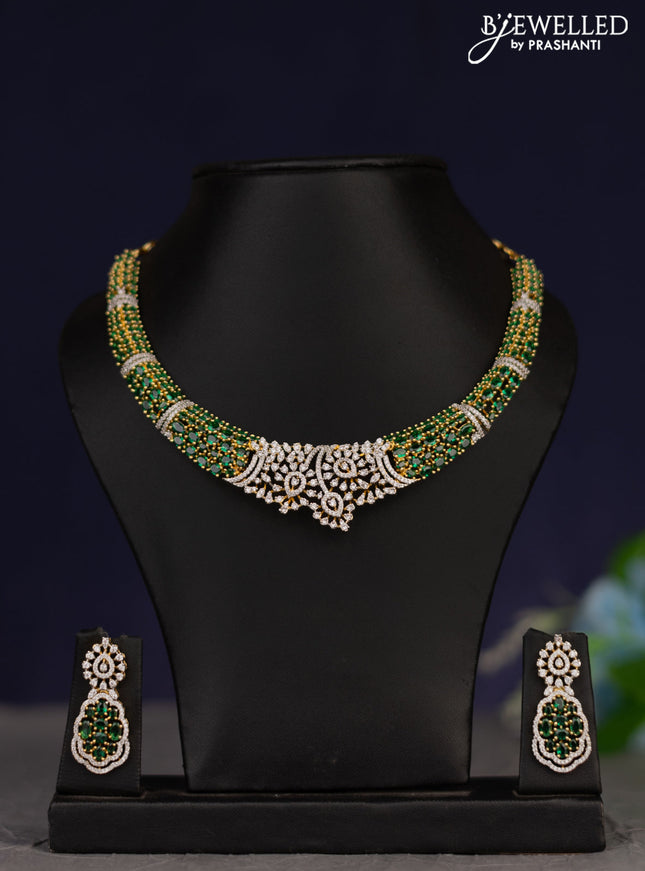 Zircon necklace with emerald and cz stones in gold finish