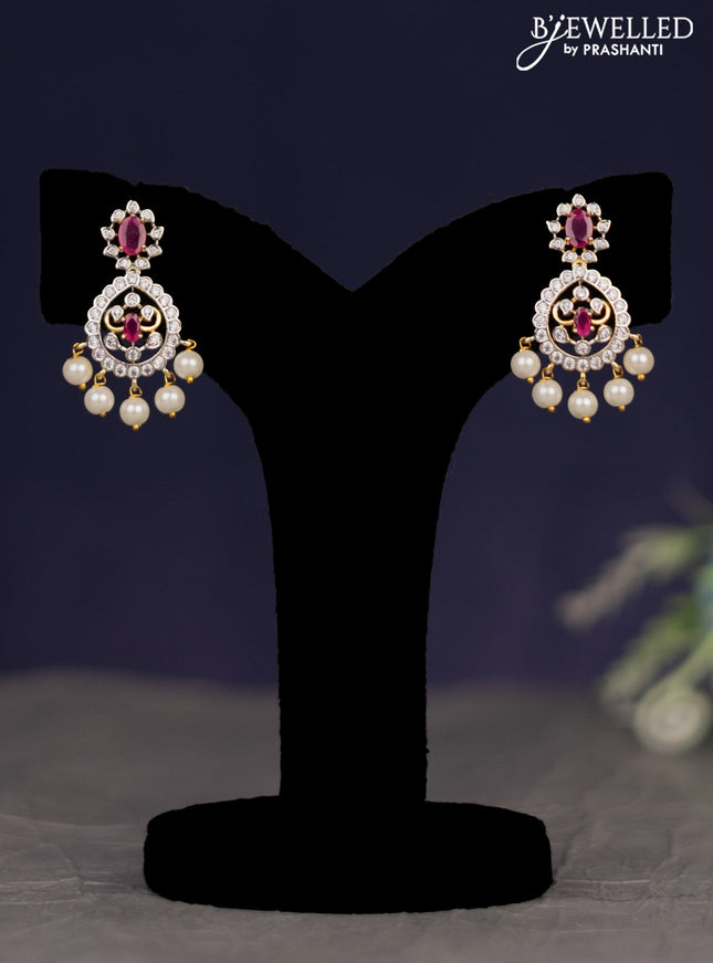 Zircon necklace with ruby & cz stones and pearl hangings in gold finish