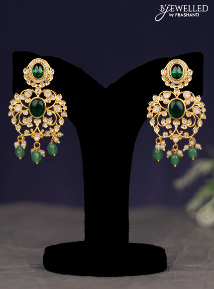 Zircon necklace with green kemp cz stones and green beads & pearl hangings in gold finish