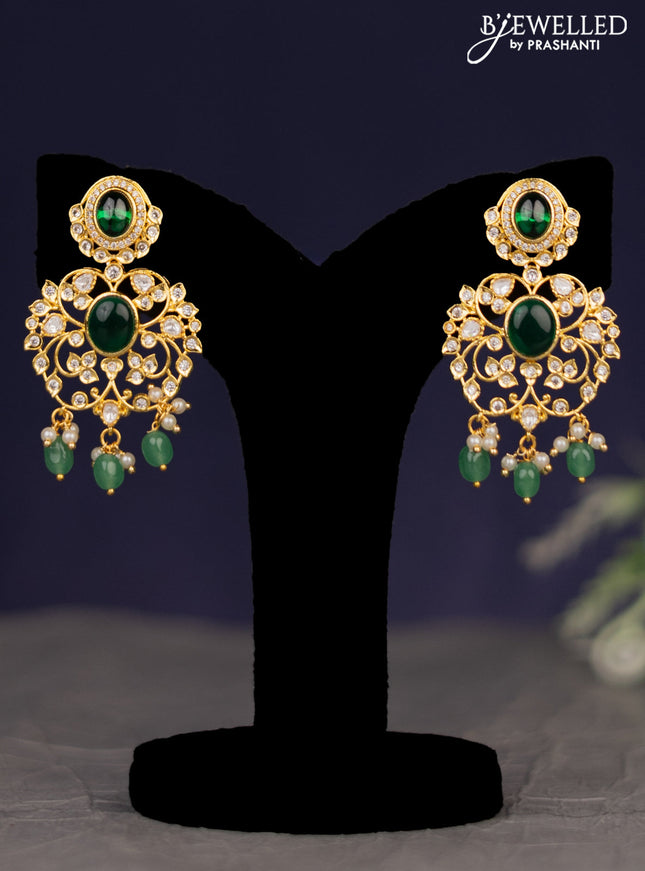 Zircon necklace with green kemp cz stones and green beads & pearl hangings in gold finish