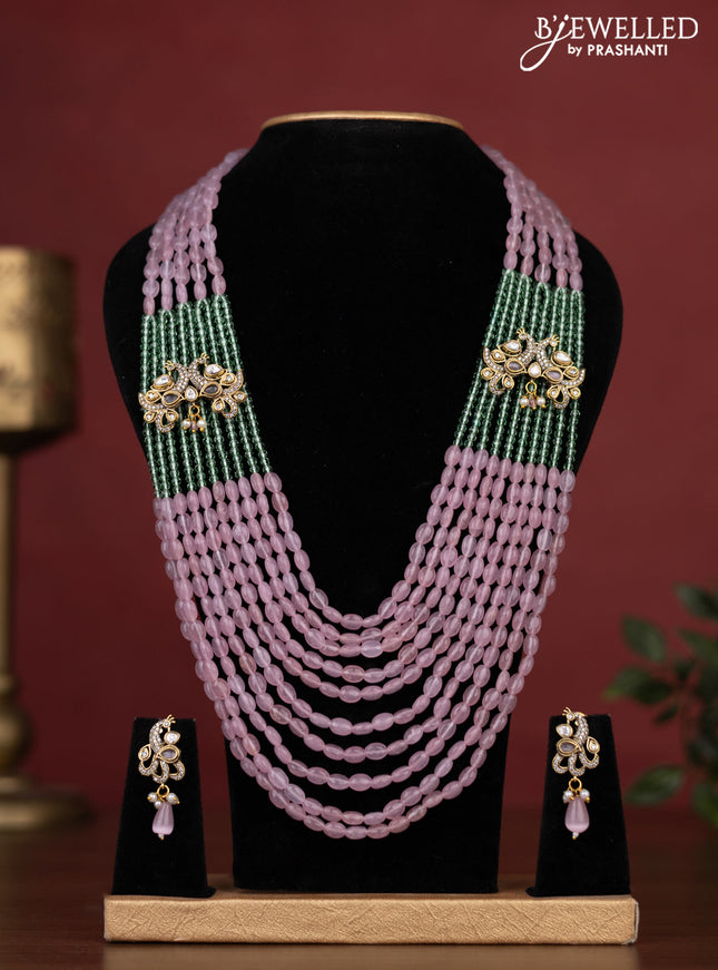 Beaded multilayer haaram with peacock side pendant and kundan & cz stones