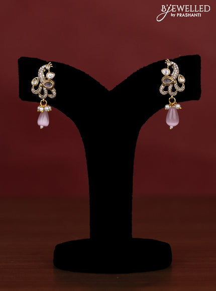 Beaded multilayer haaram with peacock side pendant and kundan & cz stones