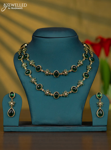 Necklace with emerald and cz stones in victorian finish