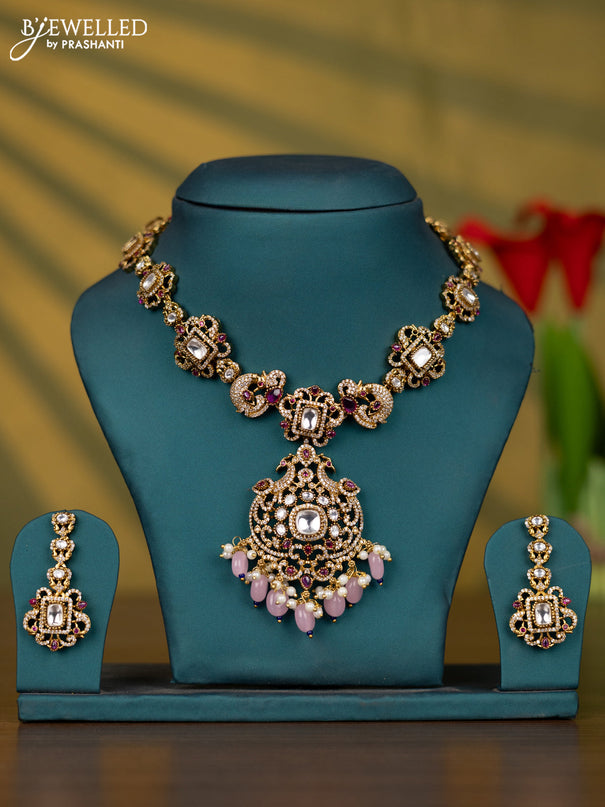 Necklace with ruby & kundan cz stones and pearl & baby pink beads hangings in victorian finish