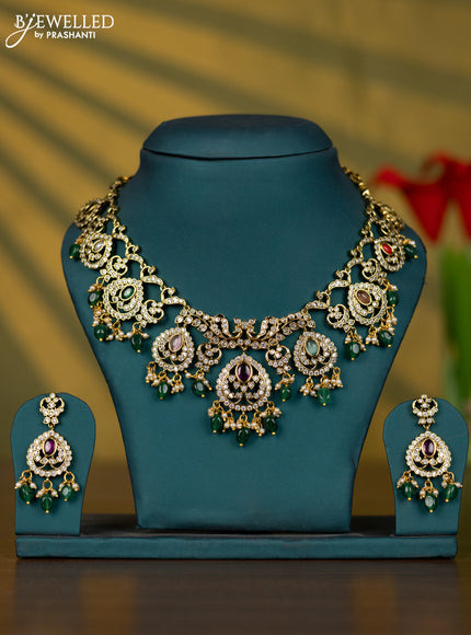 Necklace with multicolour & cz stones and pearl & green beads hangings in victorian finish