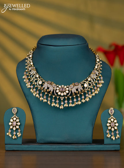 Necklace elephant design with baby pink & kundan cz stones and pearl hangings in victorian finish