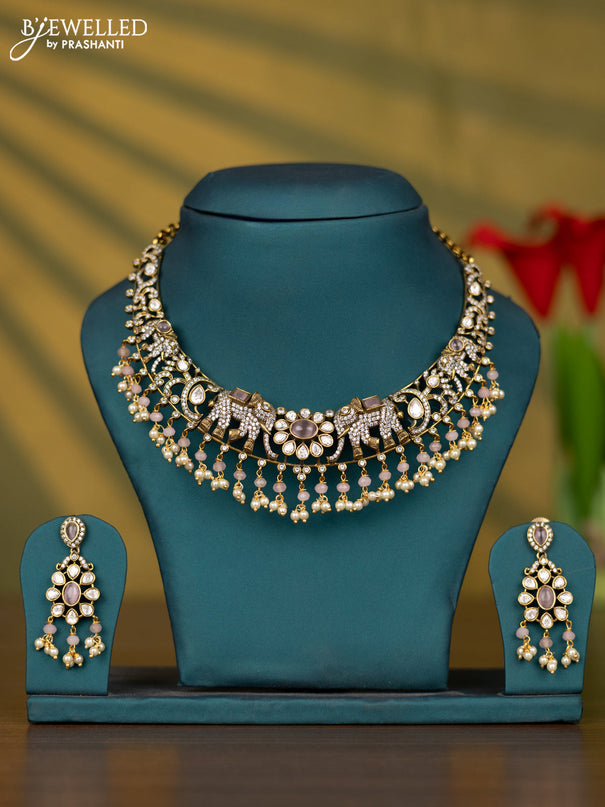 Necklace elephant design with baby pink & kundan cz stones and pearl hangings in victorian finish