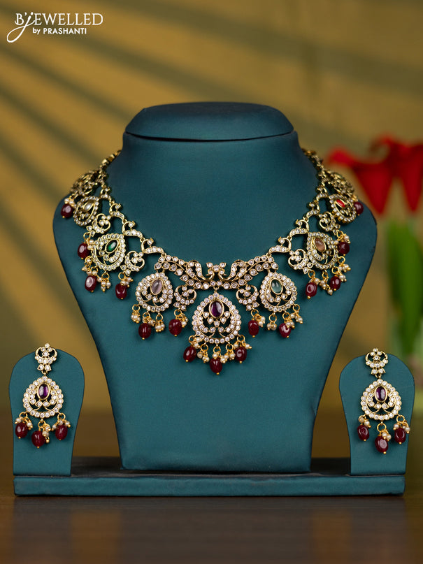 Necklace with multicolour & cz stones and pearl & maroon beads hangings in victorian finish